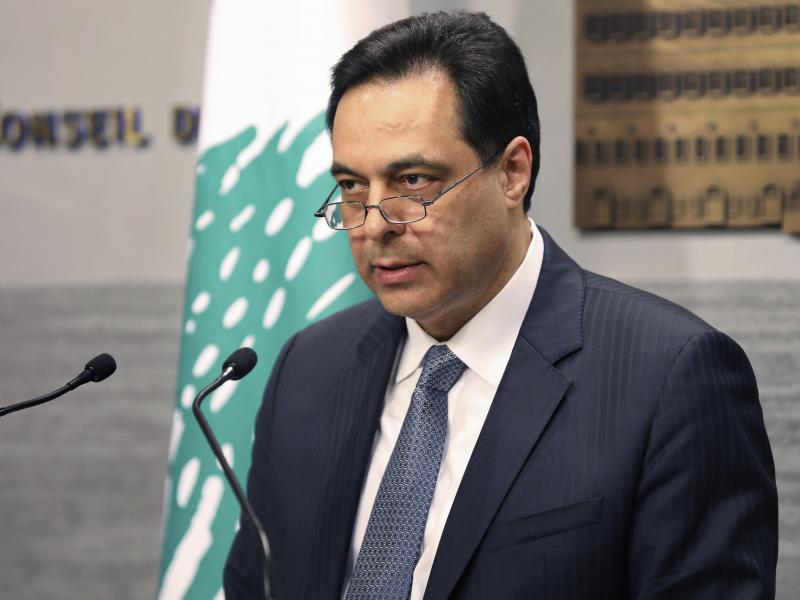 Former Lebanese Prime Minister Hassan Diab gives a speech in Beirut in March. Diab announced his resignation days after a disastrous explosion rocked Beirut. Former Lebanese Prime Minister Hassan Diab gives a speech in Beirut in March. Diab announced his resignation days after a disastrous explosion rocked Beirut.