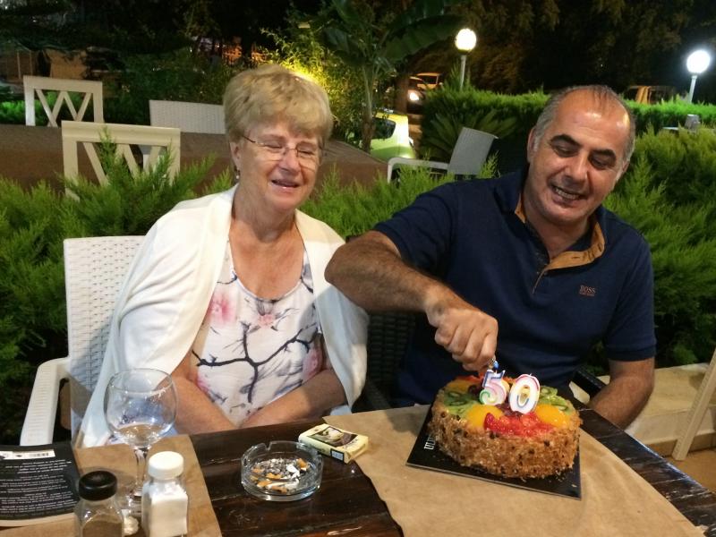 Pamela and Afshin Raghebi celebrate a birthday together. Afshin, who was born in Iran, has been stuck overseas, away from his U.S. citizen wife, for more than two years after he flew abroad for an interview at a U.S. Consulate as part of his green card ap Pamela and Afshin Raghebi celebrate a birthday together. Afshin, who was born in Iran, has been stuck overseas, away from his U.S. citizen wife, for more than two years after he flew abroad for an interview at a U.S. Consulate as part of his green card ap