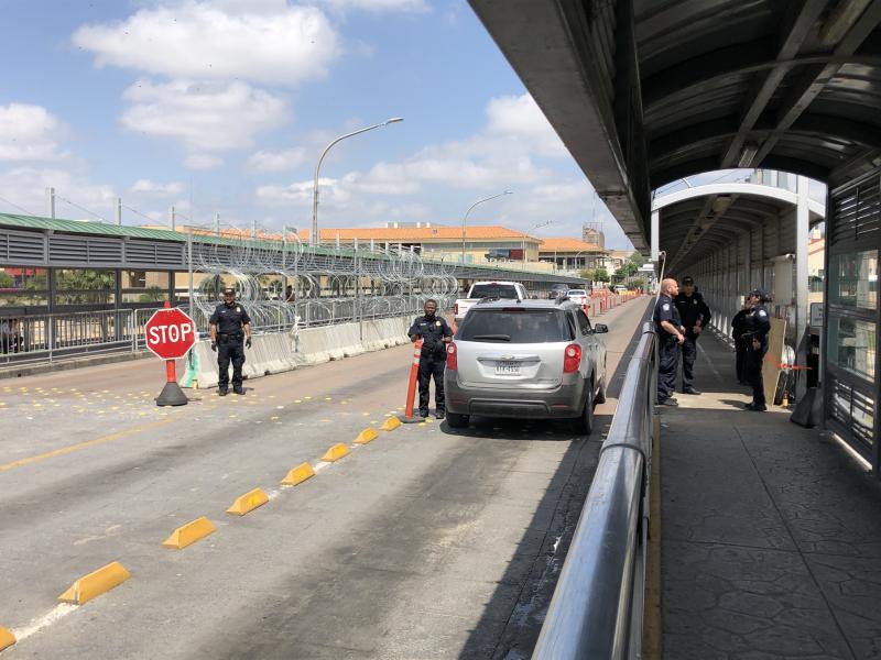 Gateway to the Americas Bridge connecting Laredo, Texas and Nuevo Laredo, Tamaulipas, Mexico, has been nearly empty. On a normal day, about 10,000 people cross from Nuevo Laredo into Laredo. This week, it's barely a trickle. Gateway to the Americas Bridge connecting Laredo, Texas and Nuevo Laredo, Tamaulipas, Mexico, has been nearly empty. On a normal day, about 10,000 people cross from Nuevo Laredo into Laredo. This week, it's barely a trickle.