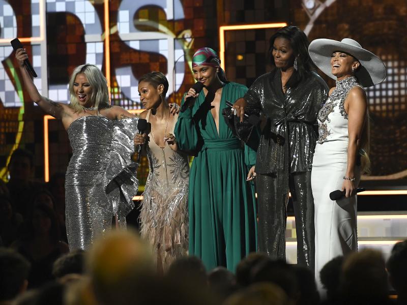 In a pointed moment, host Alicia Keys (center) opened the 61st Grammy Awards by bringing out Lady Gaga (left), Jada Pinkett Smith (second from left), Michelle Obama (second from right) and Jennifer Lopez (right) to speak about women and music. In a pointed moment, host Alicia Keys (center) opened the 61st Grammy Awards by bringing out Lady Gaga (left), Jada Pinkett Smith (second from left), Michelle Obama (second from right) and Jennifer Lopez (right) to speak about women and music.