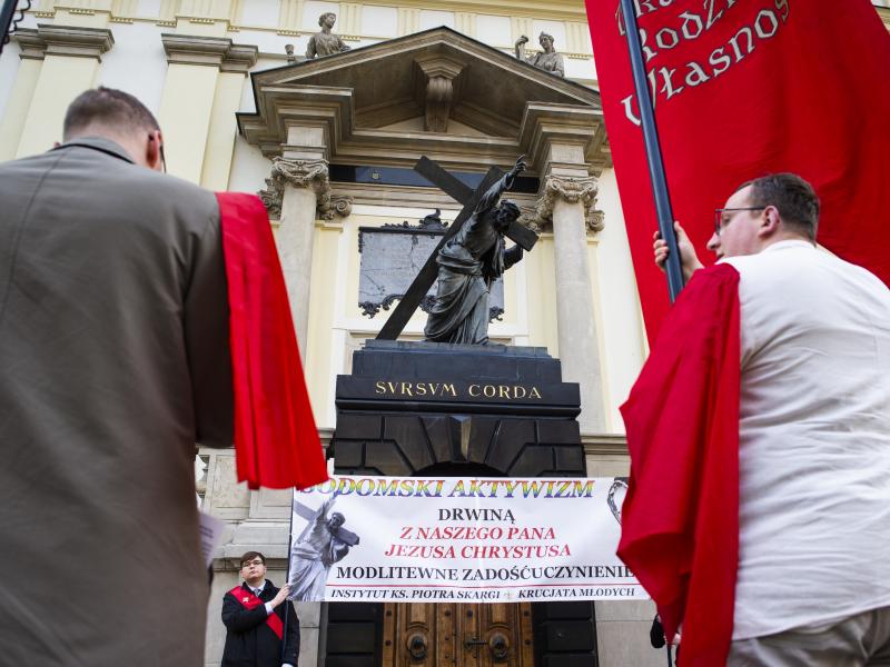 Catholics gathered in front of Warsaw's church of Holy Cross in an anti-LGBT protest in May. Catholics gathered in front of Warsaw's church of Holy Cross in an anti-LGBT protest in May.