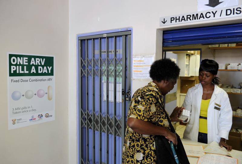 A woman receives medication at a clinic offering antiretroviral drugs for HIV patients in Ga-Rankuwa, South Africa. A woman receives medication at a clinic offering antiretroviral drugs for HIV patients in Ga-Rankuwa, South Africa.