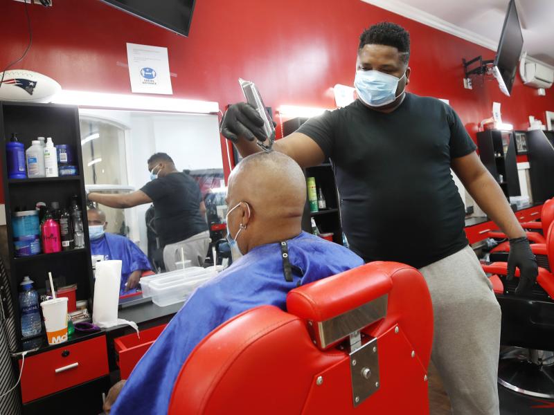 Wilkin Soto works on a customer at the Castillo Barbershop, in Lawrence, Mass., on June 5. The pace of hiring has slowed from June, when employers added a record 4.8 million jobs. Wilkin Soto works on a customer at the Castillo Barbershop, in Lawrence, Mass., on June 5. The pace of hiring has slowed from June, when employers added a record 4.8 million jobs.
