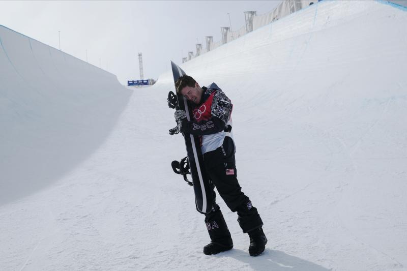White gets emotional after the men's halfpipe finals at the Beijing Olympics. White gets emotional after the men's halfpipe finals at the Beijing Olympics.