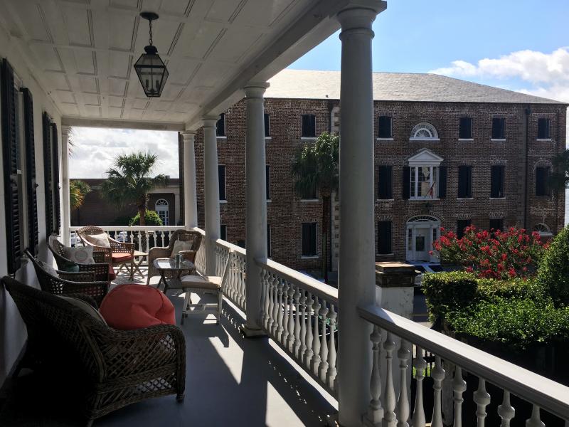 The upstairs porch of Ann Blessing's home in Charleston, S.C. has been a stop on a popular historic home tour. For the first time, visitors will tour the kitchen where enslaved people once spent most of their lives, toiling over hot fires. The upstairs porch of Ann Blessing's home in Charleston, S.C. has been a stop on a popular historic home tour. For the first time, visitors will tour the kitchen where enslaved people once spent most of their lives, toiling over hot fires.