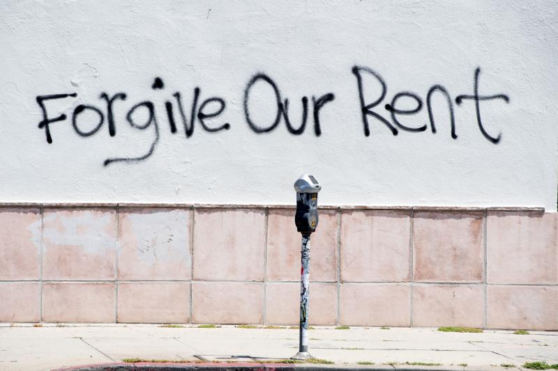 Graffiti on a wall on La Brea Ave. in Los Angeles, Calif. asking for rent forgiveness in May. This week, the city of Los Angeles rolled out a renters relief program to provide more than $100 million in assistance. Graffiti on a wall on La Brea Ave. in Los Angeles, Calif. asking for rent forgiveness in May. This week, the city of Los Angeles rolled out a renters relief program to provide more than $100 million in assistance.