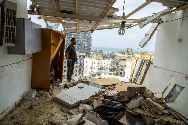 Habeb al-Hamad Azab, a Syrian refugee, stands in front of his destroyed home in Beirut's Mar Mikhael neighborhood. Habeb al-Hamad Azab, a Syrian refugee, stands in front of his destroyed home in Beirut's Mar Mikhael neighborhood.