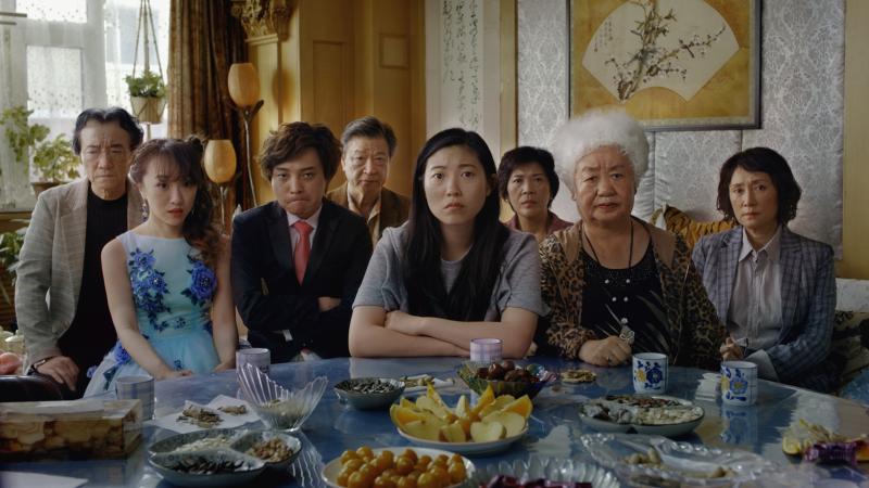 When her grandmother is diagnosed with a terminal illness, Billi (played by Awkwafina, center) reluctantly agrees to go along with her family's plan to pay respects to their matriarch — without letting her know she is dying. When her grandmother is diagnosed with a terminal illness, Billi (played by Awkwafina, center) reluctantly agrees to go along with her family's plan to pay respects to their matriarch — without letting her know she is dying.