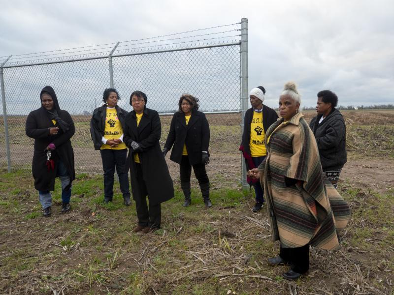 Sharon Lavigne and other members of Rise St. James, who oppose a recently approved chemical complex. They stand on its site, where archaeologists have discovered the graves of former slaves. Sharon Lavigne and other members of Rise St. James, who oppose a recently approved chemical complex. They stand on its site, where archaeologists have discovered the graves of former slaves.