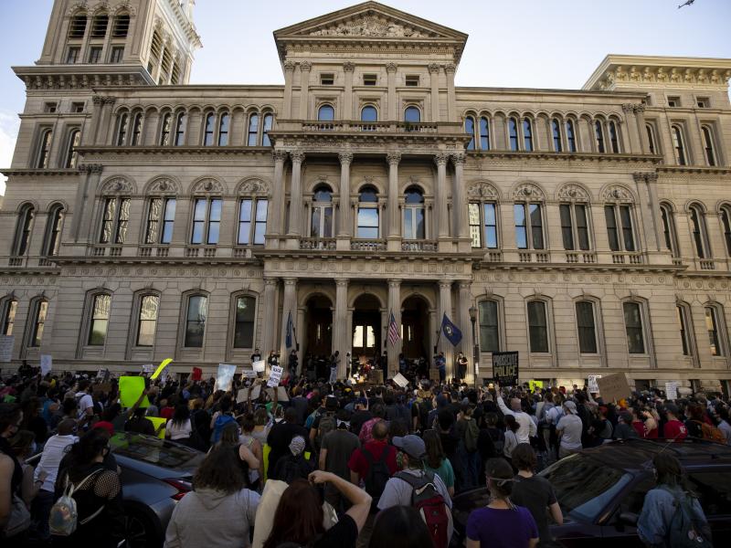 Demonstrators gather outside City Hall in Louisville, Ky., on May 29 to protest of police violence. Demonstrators gather outside City Hall in Louisville, Ky., on May 29 to protest of police violence.