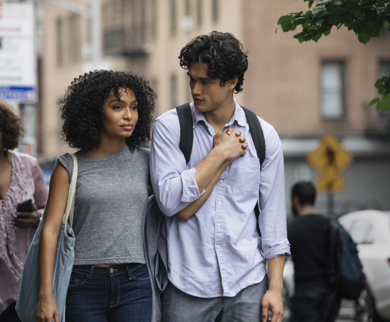 Natasha (Yara Shahidi) and Daniel (Charles Melton) fall in love over the course of a single day in the film adaptation of Nicola Yoon's young adult romance novel The Sun Is Also a Star. Natasha (Yara Shahidi) and Daniel (Charles Melton) fall in love over the course of a single day in the film adaptation of Nicola Yoon's young adult romance novel The Sun Is Also a Star.