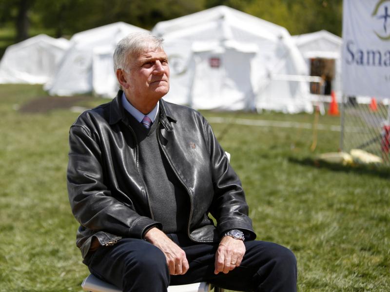 The Rev. Franklin Graham, president and CEO of Samaritan's Purse, sits for a portrait at his group's field hospital in New York's Central Park in May. Graham has spoken out in support of COVID-19 vaccines. The Rev. Franklin Graham, president and CEO of Samaritan's Purse, sits for a portrait at his group's field hospital in New York's Central Park in May. Graham has spoken out in support of COVID-19 vaccines.