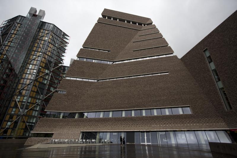 An exterior view of the new addition to the Tate Modern gallery in London in 2016. A handful of apartment owners are suing the museum, arguing it has created a state of "near constant surveillance" since opening a 10th floor terrace. An exterior view of the new addition to the Tate Modern gallery in London in 2016. A handful of apartment owners are suing the museum, arguing it has created a state of "near constant surveillance" since opening a 10th floor terrace.