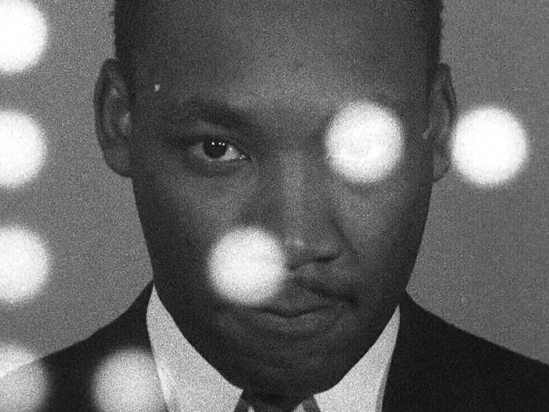 Martin Luther King Jr. in Sam Pollard's MLK/FBI. Martin Luther King Jr. in Sam Pollard's MLK/FBI.