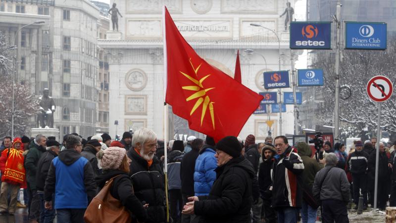 People gather outside the parliament building in Macedonia to protest the country's name change to North Macedonia. People gather outside the parliament building in Macedonia to protest the country's name change to North Macedonia.