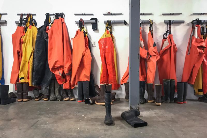 Workers' gear hangs inside Lobster Trap's facility in Steuben, Maine. Workers' gear hangs inside Lobster Trap's facility in Steuben, Maine.