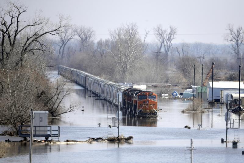 A BNSF train sits in floodwaters from the Platte River in Plattsmouth, Neb., on Sunday. Hundreds of people remained out of their homes in Nebraska as rivers began to recede. A BNSF train sits in floodwaters from the Platte River in Plattsmouth, Neb., on Sunday. Hundreds of people remained out of their homes in Nebraska as rivers began to recede.