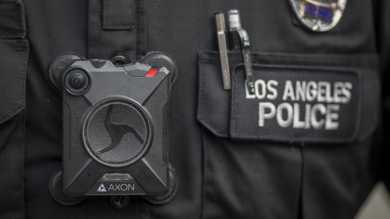A Los Angeles police officer wears an Axon body camera in 2017. On Thursday, the company announced it is holding off on facial recognition software, citing its unreliability. A Los Angeles police officer wears an Axon body camera in 2017. On Thursday, the company announced it is holding off on facial recognition software, citing its unreliability.
