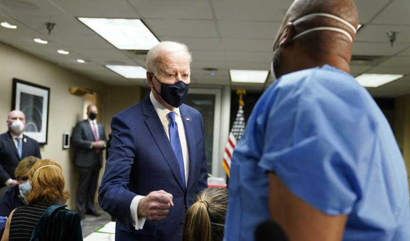 President Biden talks to recently vaccinated Army Staff Sgt. Marvin Cornish as he visits a COVID-19 vaccination site at the VA Medical Center in Washington, D.C., on Monday. President Biden talks to recently vaccinated Army Staff Sgt. Marvin Cornish as he visits a COVID-19 vaccination site at the VA Medical Center in Washington, D.C., on Monday.