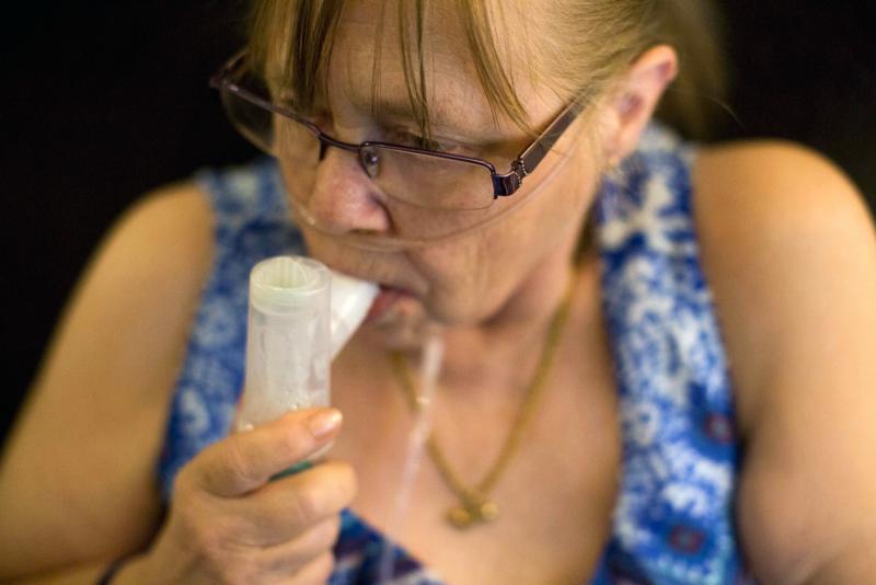 Juanita Milton, who suffers from COPD, uses her nebulizer with albuterol sulfate at her home in Live Oak, Texas. Juanita Milton, who suffers from COPD, uses her nebulizer with albuterol sulfate at her home in Live Oak, Texas.