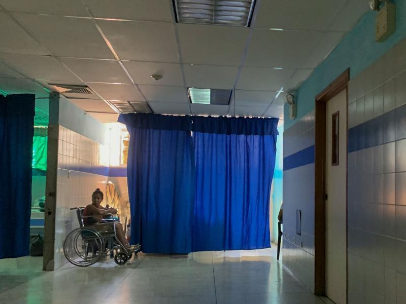 A patient on a wheelchair waits in the emergency room at a hospital in Güiria, Venezuela, on March 14. Human rights organizations recently warned that Venezuela faces catastrophic consequences from the new coronavirus pandemic, which threatens to overwhe A patient on a wheelchair waits in the emergency room at a hospital in Güiria, Venezuela, on March 14. Human rights organizations recently warned that Venezuela faces catastrophic consequences from the new coronavirus pandemic, which threatens to overwhe
