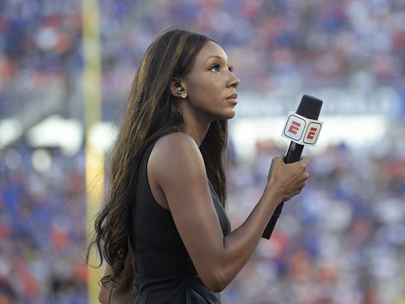 ESPN's Maria Taylor works from the sidelines during an NCAA college football game between Miami and Florida in 2019. ESPN announced Wednesday that Taylor is leaving the network. ESPN's Maria Taylor works from the sidelines during an NCAA college football game between Miami and Florida in 2019. ESPN announced Wednesday that Taylor is leaving the network.