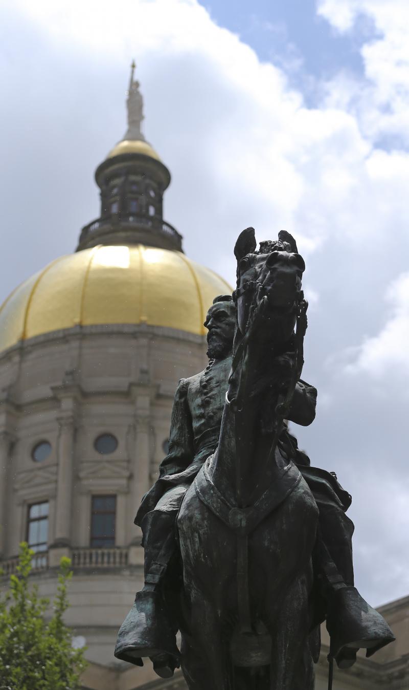 A statue depicting Confederate Gen. and former Georgia Gov. John Brown Gordon on horseback outside the Georgia Statehouse in Atlanta earlier this month. Gordon was also reputed to be a leader of the Ku Klux Klan. A statue depicting Confederate Gen. and former Georgia Gov. John Brown Gordon on horseback outside the Georgia Statehouse in Atlanta earlier this month. Gordon was also reputed to be a leader of the Ku Klux Klan.