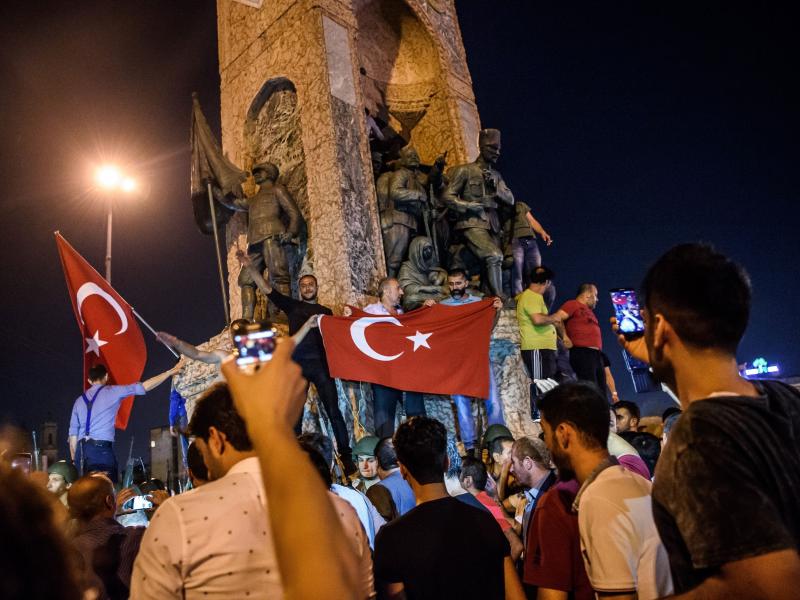 People protest against the military coup in Istanbul on July 16, 2016. Turkish military forces on July 16 opened fire on crowds gathered in Istanbul following a coup attempt, causing casualties, an AFP photographer said. People protest against the military coup in Istanbul on July 16, 2016. Turkish military forces on July 16 opened fire on crowds gathered in Istanbul following a coup attempt, causing casualties, an AFP photographer said.