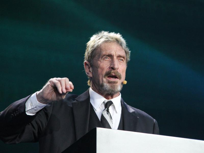 John McAfee gives a speech in August 2016 at a Beijing conference. McAfee has been arrested on tax evasion charges in Spain. John McAfee gives a speech in August 2016 at a Beijing conference. McAfee has been arrested on tax evasion charges in Spain.