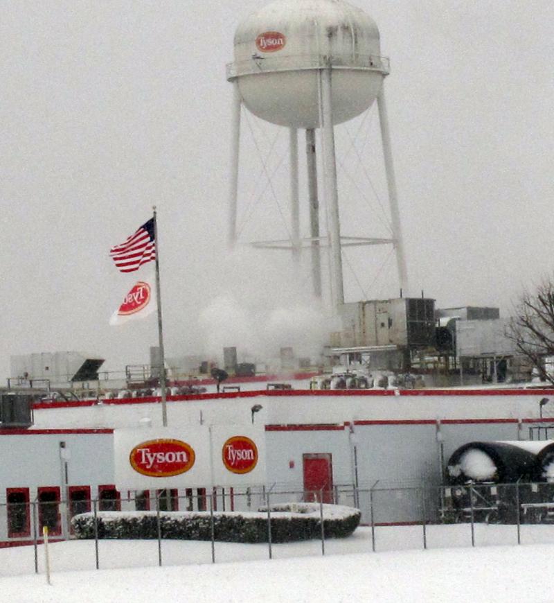 Tyson Foods says it has suspended operations at its pork plant in Columbus Junction, Iowa, pictured in February 2013, after more than two dozen workers got sick with COVID-19. Tyson Foods says it has suspended operations at its pork plant in Columbus Junction, Iowa, pictured in February 2013, after more than two dozen workers got sick with COVID-19.
