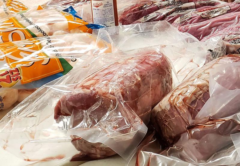 Meat sentry Ray Stack oversees raffle prizes at the Polish Falcons Hall in Depew, N.Y. Meat sentry Ray Stack oversees raffle prizes at the Polish Falcons Hall in Depew, N.Y.