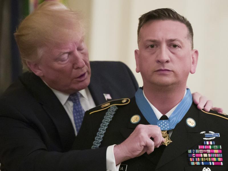 President Donald Trump presents the Medal of Honor to retired Army Staff Sgt. David Bellavia in the East Room of the White House on Tuesday. Bellavia received the award for conspicuous gallantry while serving in support of Operation Phantom Fury in Falluj President Donald Trump presents the Medal of Honor to retired Army Staff Sgt. David Bellavia in the East Room of the White House on Tuesday. Bellavia received the award for conspicuous gallantry while serving in support of Operation Phantom Fury in Falluj