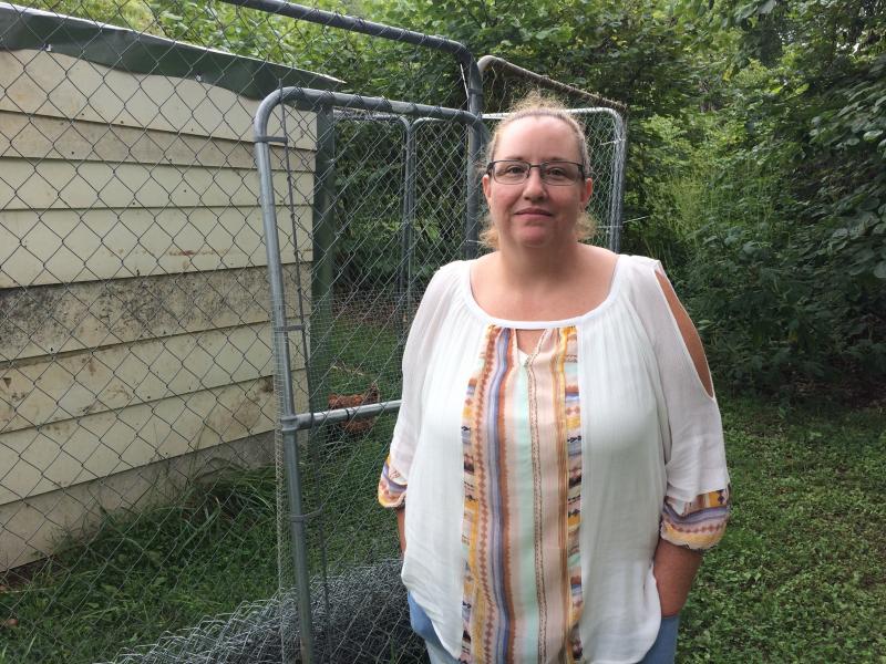 Medical debts weigh on Geneva Wilson, who keeps a chicken and rooster in a coop behind her cabin in rural southwest Missouri. Medical debts weigh on Geneva Wilson, who keeps a chicken and rooster in a coop behind her cabin in rural southwest Missouri.