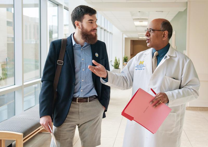 Dr. Raj Mangrulkar and medical student Jesse Burk-Rafel at the University of Michigan Medical School. Good communication skills, teamwork and adaptability will help doctors thrive through swift changes in medical science, Mangrulkar says. Dr. Raj Mangrulkar and medical student Jesse Burk-Rafel at the University of Michigan Medical School. Good communication skills, teamwork and adaptability will help doctors thrive through swift changes in medical science, Mangrulkar says.