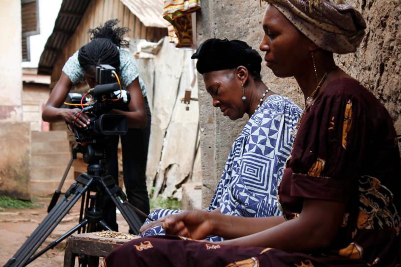 Rosine Mbakam, left, says she chose to shoot all images and sound herself to maintain an equal relationship with the subjects of her films. Rosine Mbakam, left, says she chose to shoot all images and sound herself to maintain an equal relationship with the subjects of her films.