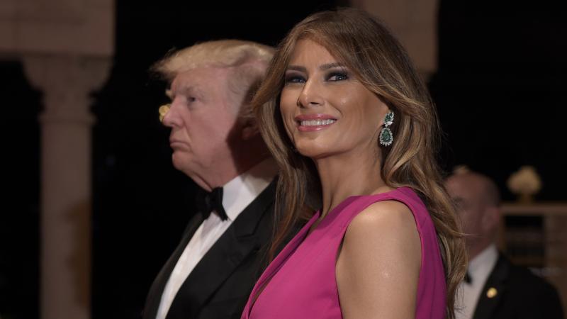 President Trump and first lady Melania Trump arrive for the 60th annual Red Cross Gala at Trump's Mar-a-Lago resort in Palm Beach, Fla., on Saturday. President Trump and first lady Melania Trump arrive for the 60th annual Red Cross Gala at Trump's Mar-a-Lago resort in Palm Beach, Fla., on Saturday.