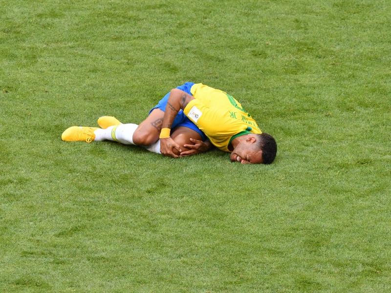 Neymar reacts after a tackle during the Russia 2018 World Cup match between Brazil and Mexico in Samara on Monday. Neymar reacts after a tackle during the Russia 2018 World Cup match between Brazil and Mexico in Samara on Monday.