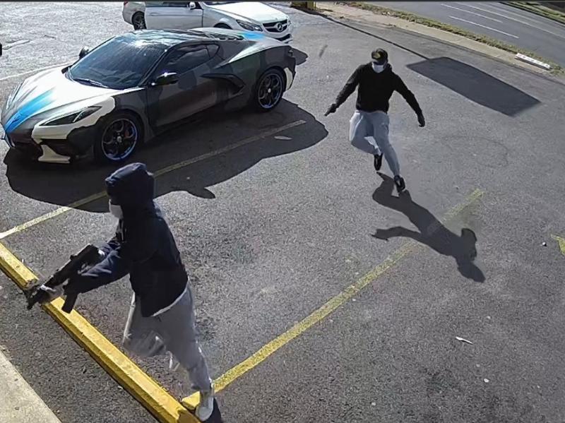 The Memphis Police Department attained surveillance video showing two armed suspects getting out of a white two-door Mercedes Benz and approaching rapper Young Dolph while he was inside Makeda's Cookies. The Memphis Police Department attained surveillance video showing two armed suspects getting out of a white two-door Mercedes Benz and approaching rapper Young Dolph while he was inside Makeda's Cookies.