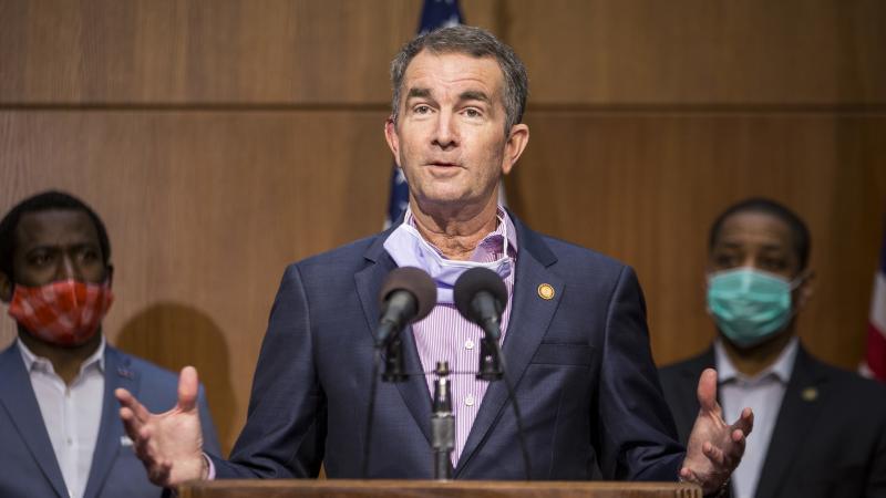 Virginia Gov. Ralph Northam was mentioned as a potential target for kidnapping when a group met to discuss plots to punish governors for their response to the coronavirus, the FBI says. Northam is seen here at a news conference in June in Richmond. Virginia Gov. Ralph Northam was mentioned as a potential target for kidnapping when a group met to discuss plots to punish governors for their response to the coronavirus, the FBI says. Northam is seen here at a news conference in June in Richmond.