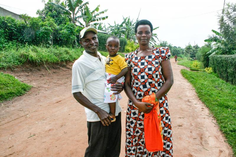 Jean Marie Rukundo and his wife, Theodosie Uwambajimana, with their 2-year-old daughter. They've nicknamed her "Rwamrec," the acronym for a resource center in Rwanda that taught Rukundo how to step up his game as a spouse and father. When he came with his Jean Marie Rukundo and his wife, Theodosie Uwambajimana, with their 2-year-old daughter. They've nicknamed her "Rwamrec," the acronym for a resource center in Rwanda that taught Rukundo how to step up his game as a spouse and father. When he came with his