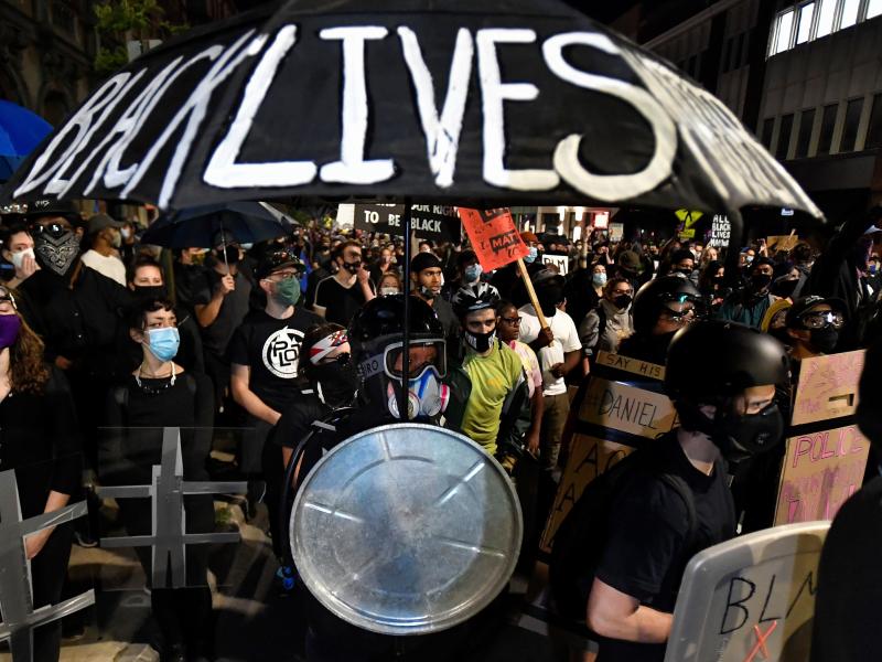 Demonstrators march through the streets of Rochester, N.Y., earlier this month protesting the death of Daniel Prude, apparently stopped breathing as police were restraining him in March. Demonstrators march through the streets of Rochester, N.Y., earlier this month protesting the death of Daniel Prude, apparently stopped breathing as police were restraining him in March.