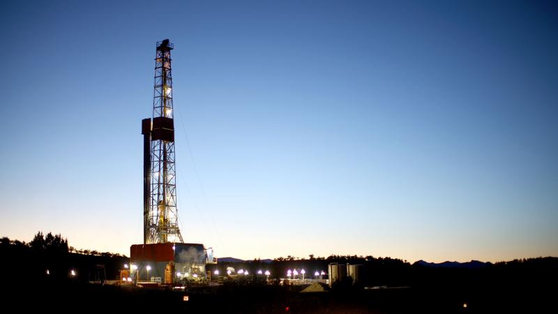 A natural gas drilling rig's lights shimmer in the evening light near Silt, Colo. Methane is the main component of natural gas, and studies show some methane escapes from leaky oil and gas operations. A natural gas drilling rig's lights shimmer in the evening light near Silt, Colo. Methane is the main component of natural gas, and studies show some methane escapes from leaky oil and gas operations.