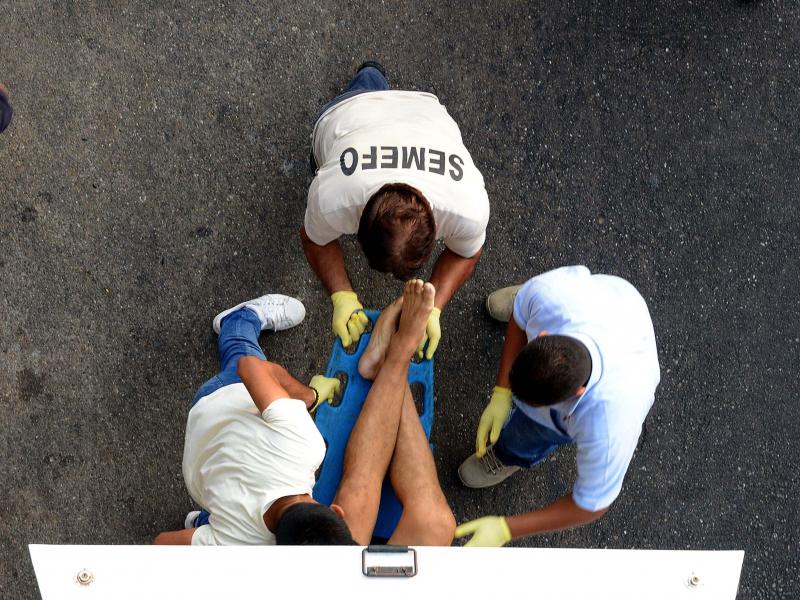 Forensic personnel load the corpse of a man into a van, after he was executed at a shopping mall in Acapulco, Mexico, on April 24, 2018. A new report recorded more than 33,000 homicides in 2018, making it the country's deadliest on record. Forensic personnel load the corpse of a man into a van, after he was executed at a shopping mall in Acapulco, Mexico, on April 24, 2018. A new report recorded more than 33,000 homicides in 2018, making it the country's deadliest on record.