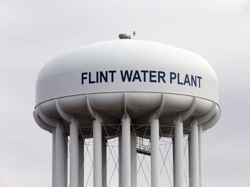 The Flint Water Plant tower in Flint, Mich., where drinking water became tainted after the city switched from the Detroit system and began drawing from the Flint River in April 2014 to save money. The Flint Water Plant tower in Flint, Mich., where drinking water became tainted after the city switched from the Detroit system and began drawing from the Flint River in April 2014 to save money.