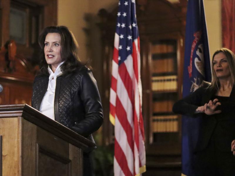 Michigan Gov. Gretchen Whitmer addresses the state during a speech Thursday in Lansing. Thirteen members of two militia groups face criminal charges after allegedly plotting to kidnap Whitmer. Michigan Gov. Gretchen Whitmer addresses the state during a speech Thursday in Lansing. Thirteen members of two militia groups face criminal charges after allegedly plotting to kidnap Whitmer.