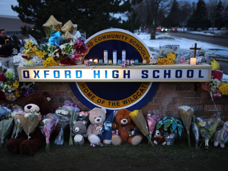 A makeshift memorial seen outside Oxford High School in Oxford, Mich., on Wednesday honors the four students who were fatally shot and seven people who were injured. A makeshift memorial seen outside Oxford High School in Oxford, Mich., on Wednesday honors the four students who were fatally shot and seven people who were injured.