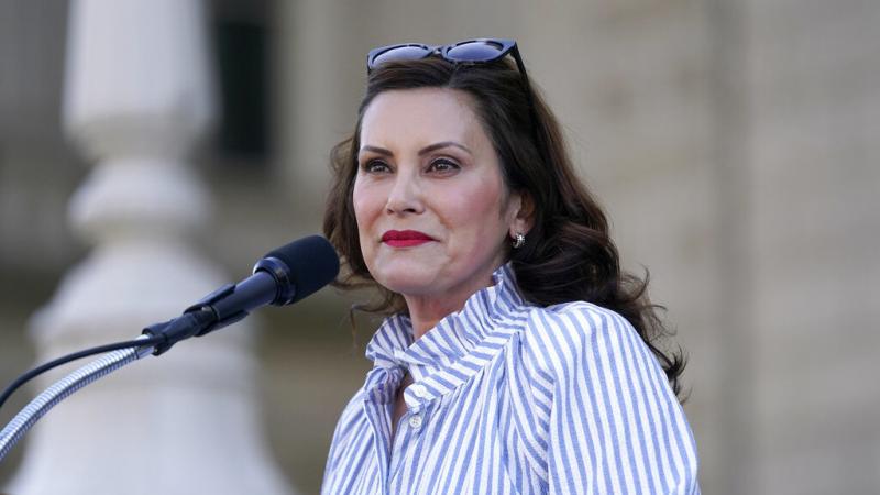 Gov. Gretchen Whitmer speaks to abortion-rights protesters Friday at a rally outside the state capitol in Lansing, Mich., following the Supreme Court's decision to overturn Roe v. Wade. Gov. Gretchen Whitmer speaks to abortion-rights protesters Friday at a rally outside the state capitol in Lansing, Mich., following the Supreme Court's decision to overturn Roe v. Wade.