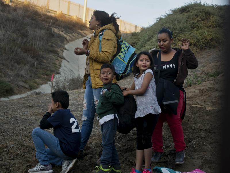 Honduran migrants surrender to the U.S. Border Patrol after crossing a border wall into the United States. According to new federal data, the number of migrants apprehended crossing the border in recent months has surged. Honduran migrants surrender to the U.S. Border Patrol after crossing a border wall into the United States. According to new federal data, the number of migrants apprehended crossing the border in recent months has surged.