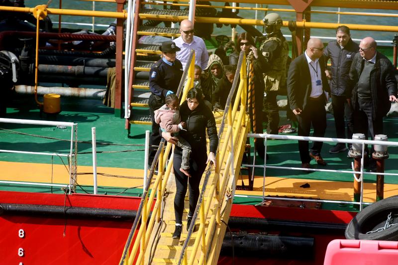 Migrants disembark from the motor tanker El Hiblu 1 in Valletta's Grand Harbour after Maltese armed forces took control of the vessel on Thursday. Migrants disembark from the motor tanker El Hiblu 1 in Valletta's Grand Harbour after Maltese armed forces took control of the vessel on Thursday.
