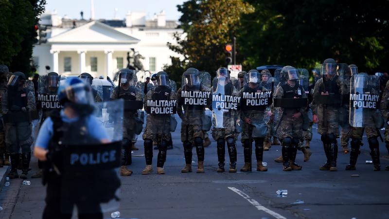 Military police hold a line near the White House as demonstrators gather to protest police brutality on June 1, 2020 in Washington, D.C. Military police hold a line near the White House as demonstrators gather to protest police brutality on June 1, 2020 in Washington, D.C.